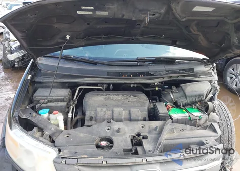 2012 Honda Odyssey Touring/Touring Elite z USA, uszkodzony, nr VIN 5FNRL5H97CB144777